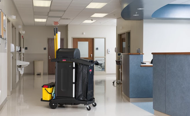 A Rubbermaid Commercial Executive High-Security Janitorial Cleaning Cart, featuring a locking hood for security.