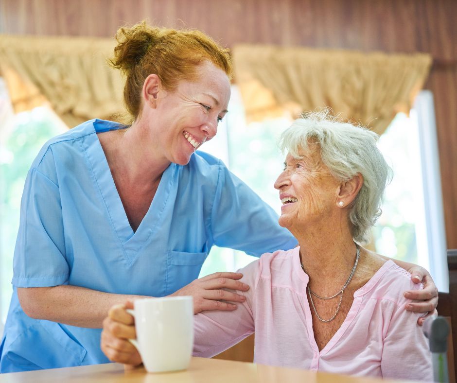 A caregiver and an old woman in an aged care center