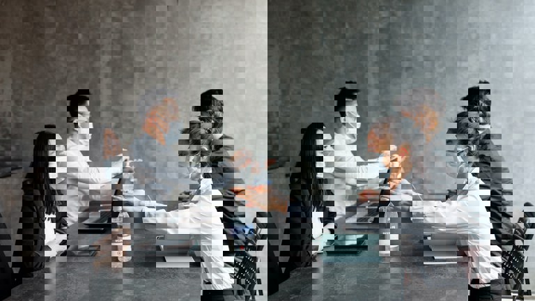 Young Business People Wearing Face Masks